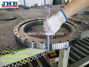 China VLI 200644 N four point contact ball slewing bearing with flange and internal teeth 748x546x56mm supplier